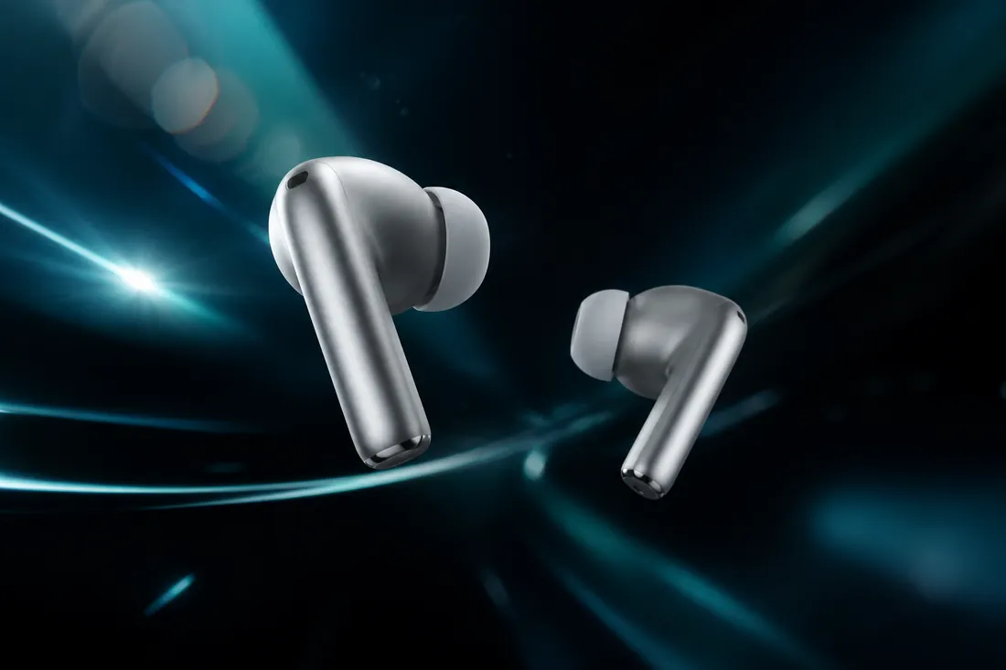 Silver wireless earbuds floating in dark space with teal light trails